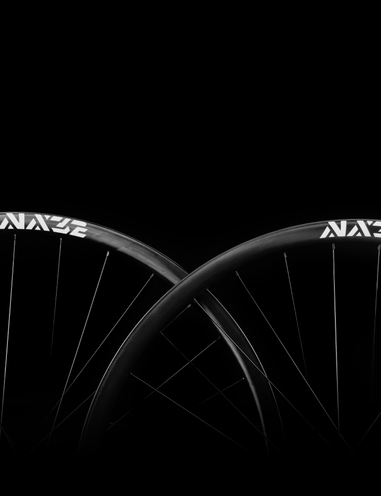 pad-s-light-bicycle-anax32-32er-carbon-wheel-greater-contact-patch-better-handling.jpeg